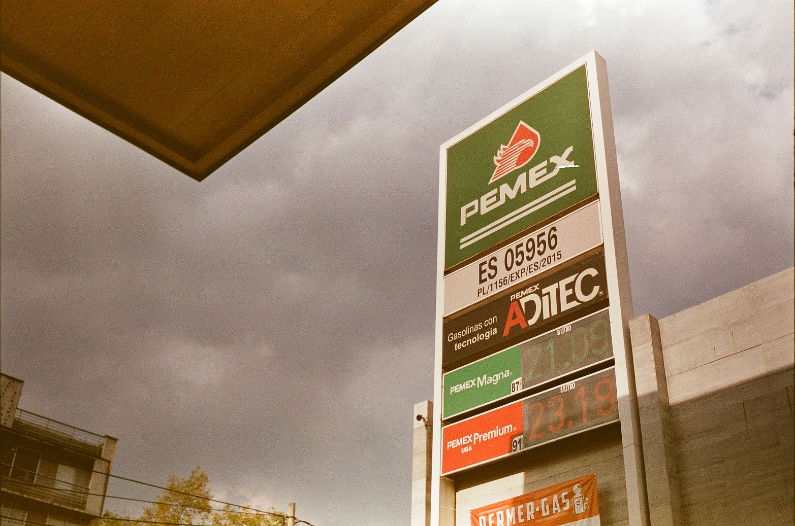 PEMEX gas station price sign in Mexico City with digital fuel prices and branded panels