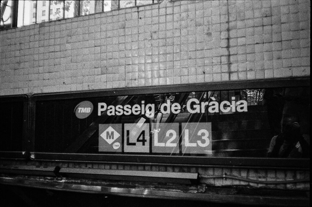 Passeig de Gracia metro station sign with TMB logo and line markers L4 L2 and L3 in Barcelona
